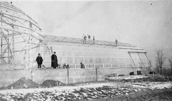 Black and white photograph depicting construction of the conservatory, ca. 1915. 