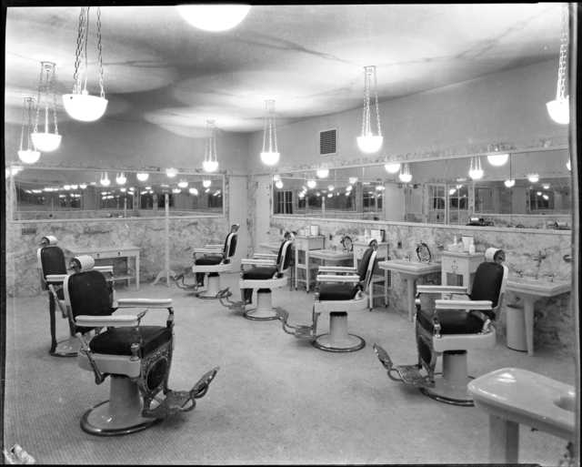 Black and white photograph of the St. Paul Athletic Club barbershop, c.1925. Photograph by Charles P. Gibson.