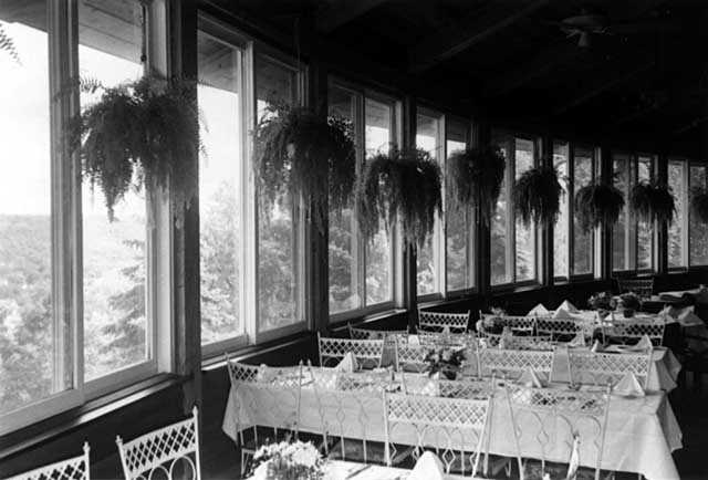 Black and white photograph of the interior of the dining room of the University Club, overlooking St. Paul, June 22, 1977. Photographed by Julian G. Plante.