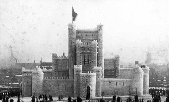 Black and white cabinet photograph of the Winter Carnival ice palace in St. Paul's Central Park. Taken in 1886 by Allen Swain.