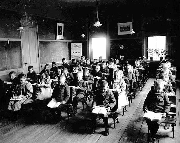 Black and white photograph of a classroom at the State School, c.1905.