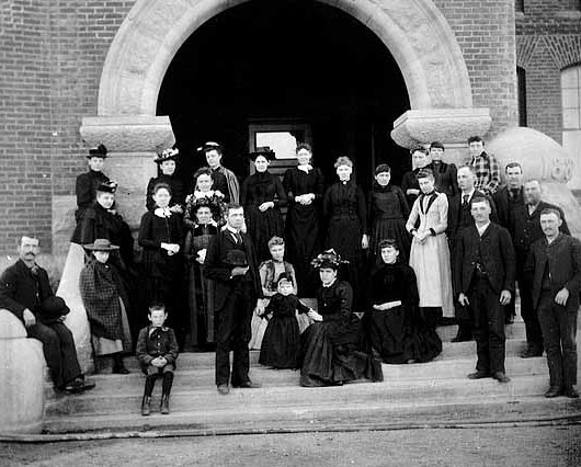 Black and white photograph of faculty of the State School, c.1885.