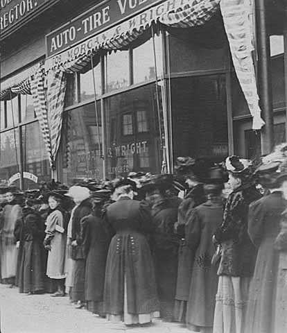Women waiting in line to vote in an election (probably for a school board) in a downtown Minneapolis precinct c.1908.