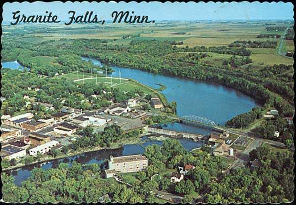Color postcard showing an aerial view of Granite Falls, c.1965.