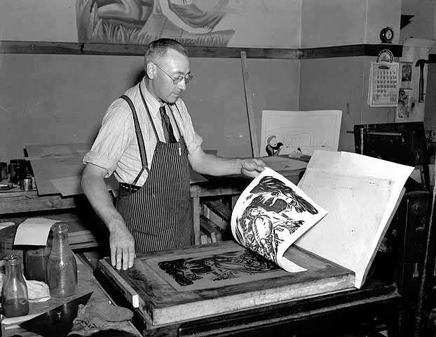 Black and white photograph of a lithographer at work, 1938.