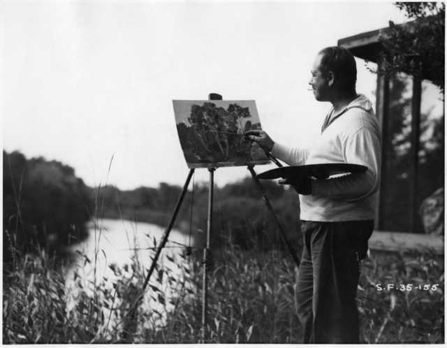 Black and white photograph of Clement Haupers painting at Rutledge, c.1934.