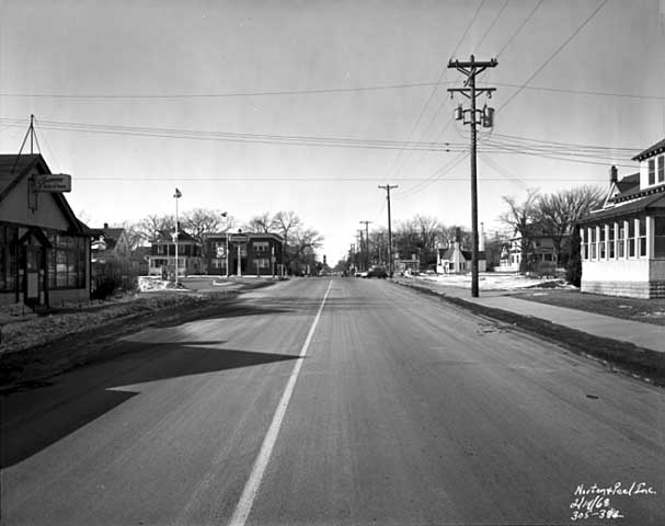 Black and white photograph of East 38th St near Portland Ave, Minneapolis, 1968. 