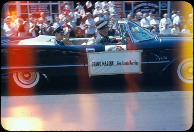 Grand Marshal General Lauris Norstad in a convertible at the Centennial Parade, St. Paul