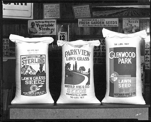 Bags of Northrup, King and Company lawn seeds