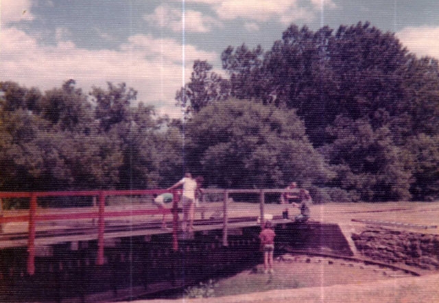 Color image of Poco-a-Poco 4-H Club members restoring the Chicago, St. Paul, Minneapolis & Omaha turntable, 1972.