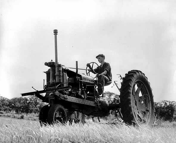 Black and white photograph of a Farmall tractor on the farm of Mike O'Boyle, St. Paul Park, 1938.