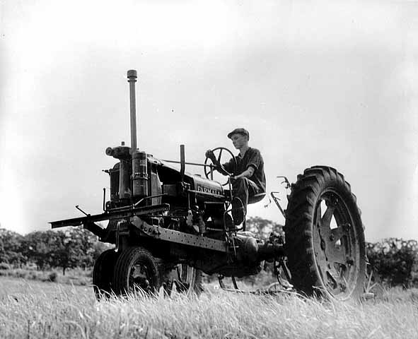 Black and white photograph of a Farmall tractor on the farm of Mike O'Boyle, St. Paul Park, 1938.