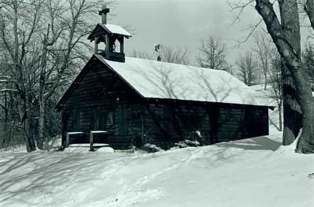 Black and white photograph of the restored Dakota mission of Stephen R. Riggs and Thomas S. Williamson at Lac qui Parle State Park, 1971. Photographed by Jack Renshaw.