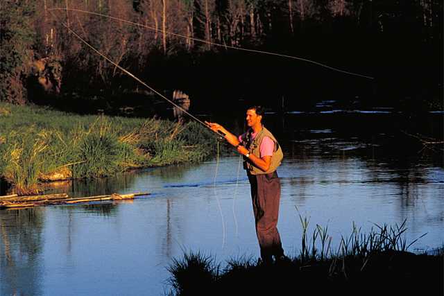 Trout fishing in the Whitewater River. Minnesota Department of Natural Resources, ca. 2000s.