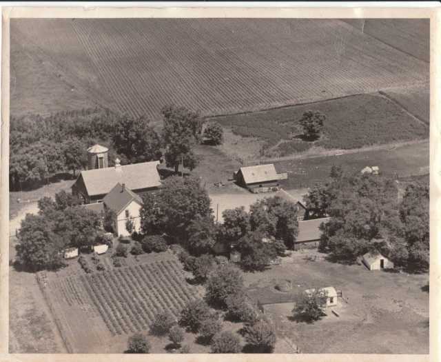 Black and white photograph of the Wiens family homestead, ca. 1950s