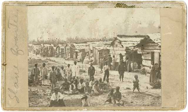Enslaved people and their homes, Helena, Arkansas; taken while Sixth Minnesota Volunteers were camped in Helena.