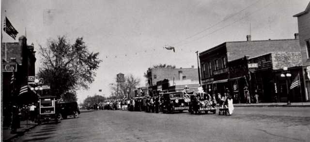Black and white photograph of a parade in Slayton, 1930.
