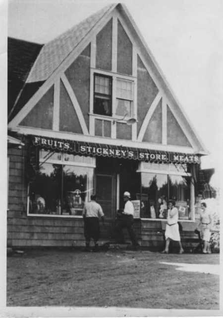 Black and white photograph of the exterior of Stickney’s grocery store, ca. 1930s.