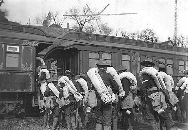 Members of the 15th Minnesota Regiment boarding train for Camp Meade.