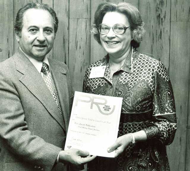 Black and white photograph of members of the United Jewish Federation Council receive a public relations award on November 24, 1978.