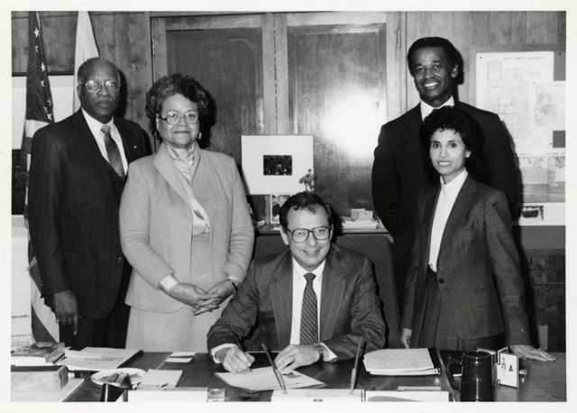 Photo related to United Negro College Fund. Pictured are (left to right) Oscar and Virginia Howard, Minneapolis Mayor Donald Fraser, and Claudeth and Gene Washington, December 1984. Oscar C. Howard papers, 1945–1990 (P1842), personal papers (1945–1990), Manuscripts Collection, Minnesota Historical Society.