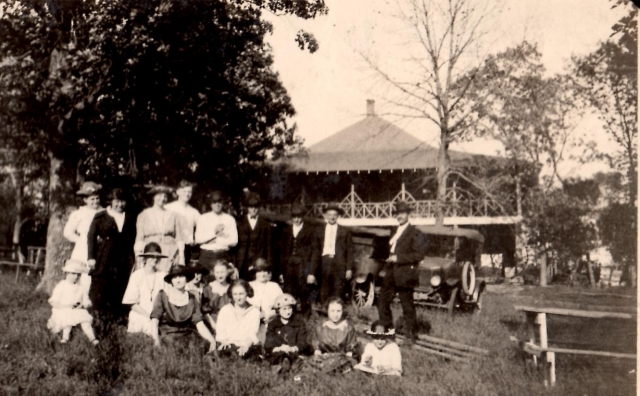 Black and white photograph of people in front of the Valhalla Island Resort pavilion on Lake Shetek, ca. 1920s. 