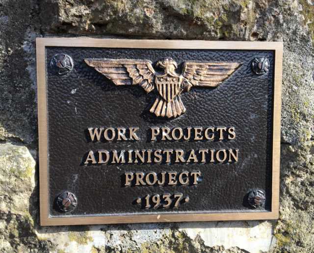 Color image of a WPA plaque near the Minneopa Falls at Minneopa State Park, April 8, 2017. Photograph by Karin J. Green.