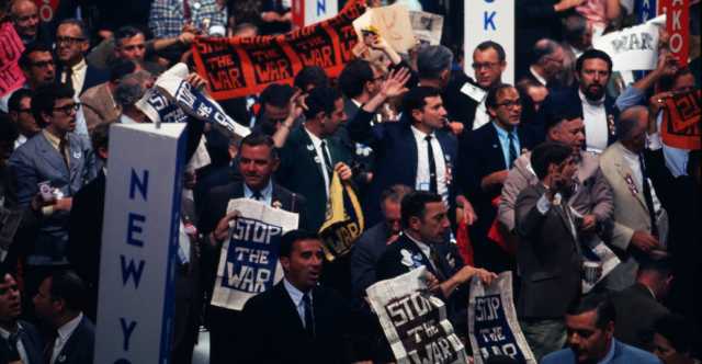 Color image of anti-war delegates oppose Humphrey’s nomination at the 1968 Democratic Convention in Chicago.