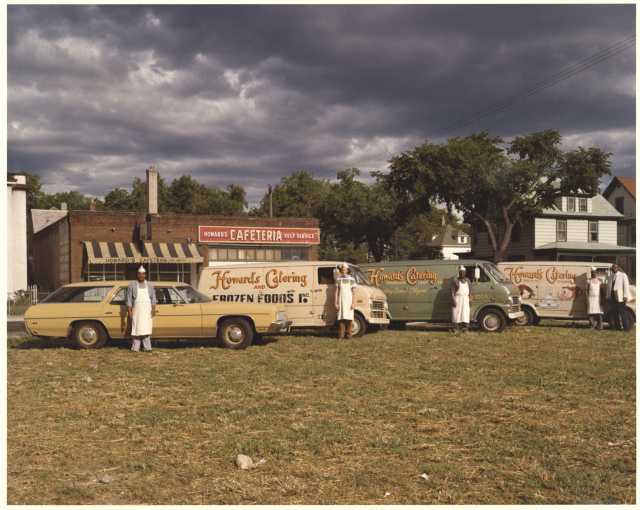 Howard’s Cafeteria with four catering delivery vehicles, 3300 Fourth Ave South, Minneapolis, ca. 1970s. Photo by H.M. Schwang Photo Co. Oscar C. Howard papers, 1945–1990 (P1842), Cafeteria and Industrial Catering Business, Manuscripts Collection, Minnesota Historical Society.