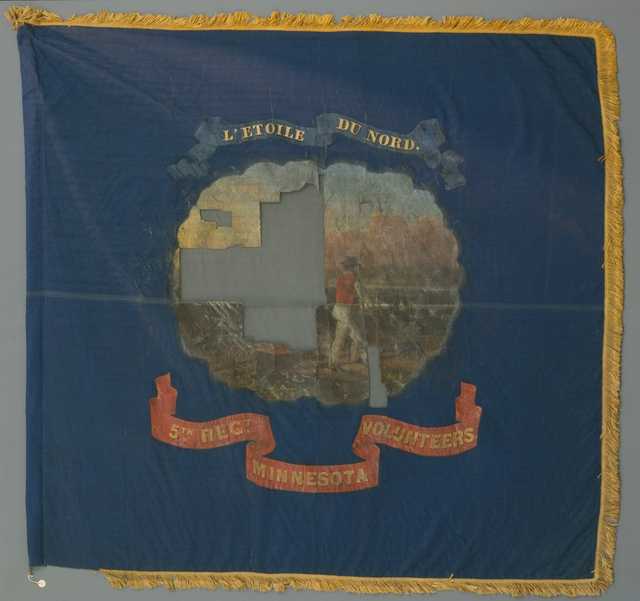 Blue silk battle flag with the state seal of Minnesota painted on the center