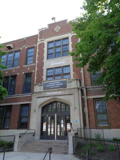 Color image of the front entrance of Cleveland Junior High School (now Farnsworth Aerospace Pre-K-8 School) in St. Paul designed by Clarence Wigington and built in 1924. Photographed by Paul Nelson on August 15, 2014.