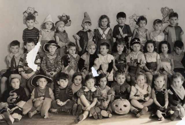 Black and white photograph of a Halloween party for the pre-kindergarten class at the Jewish Educational Center in St. Paul, 1937. 