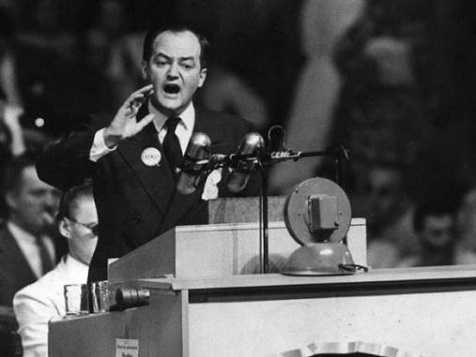 Black and white photograph of Hubert Humphrey delivering a speech on civil rights at the 1948 Democratic National Convention in Philadelphia.