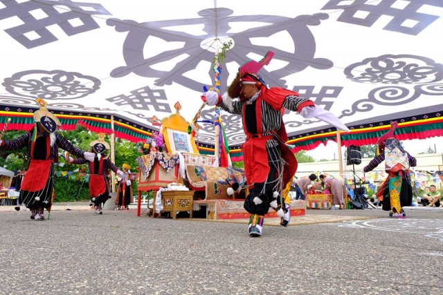 Tibetan Americans perform a traditional Tibetan opera in front of the Tibetan American Foundation of Minnesota in St. Paul, ca. 2018. Photograph by Tashi Khongtsotsang.