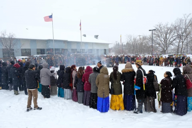 Tibetan Minnesotans perform an incense-burning ceremony for the wellbeing and health of their spiritual leader, His Holiness the Dalai Lama at the Tibetan American Foundation of Minnesota in St. Paul, ca. 2018. Photograph by Tashi Khongtsotsang. 