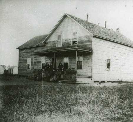 Black and white photograph of the first school at St. Mary's Mission, Red Lake, Minnesota, c.1880s.