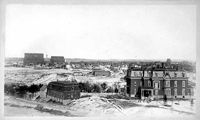 View of Lowry District of Minneapolis; Thomas Lowry residence in foreground at H
