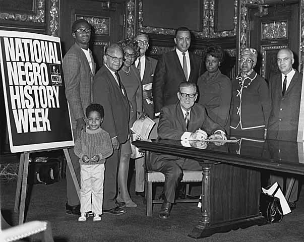 Harold LeVander signing a proclamation