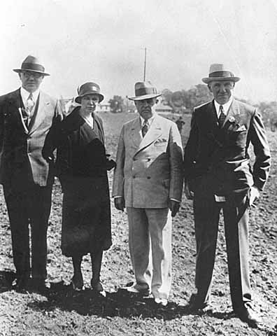 Myrtle Cain with O. W. Behrues, Mike E. Collins, and Floyd B. Olson