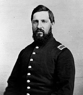 Black and white photograph of Merrill Dwelle, member of the Second Company of Minnesota Sharpshooters, c.1864. Photograph by Joel Emmons Whitney.