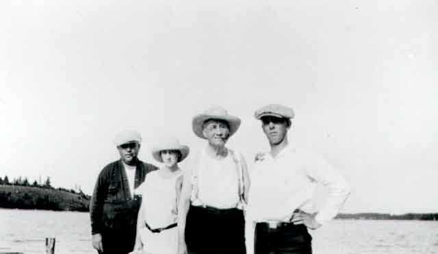 Black and white photograph of Daniel Hogan (far left) and family, c.1926. Hogan was was instrumental in the operation of the O'Connor system.