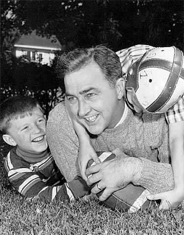 Black and white photograph of Eugene McCarthy with son Michael and unknown boy, c.1959.