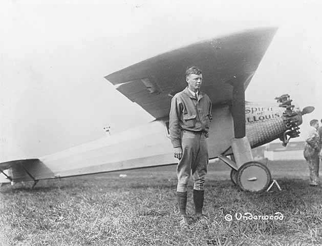 Black and white photograph of Charles Lindbergh with “Spirit of St. Louis,” c.1927.