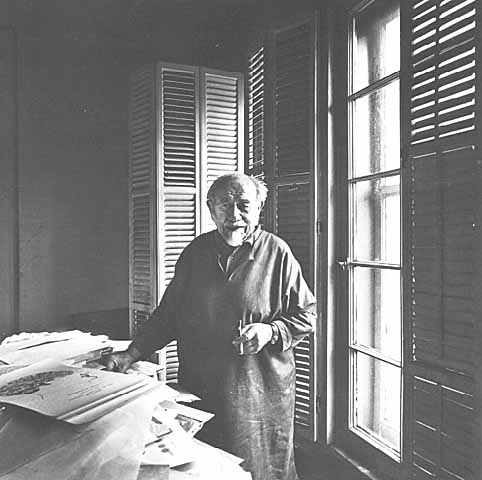 Black and white photograph of Clement Haupers in his studio, 1975.