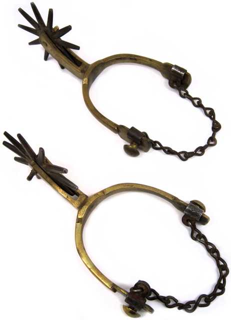 Pair of brass western style spurs with metal boot straps. Each spur has a ten point iron rowel. The spurs were worn during the Civil War by Major Thomas B. Wilson of the 4th Minnesota Volunteer Infantry Regiment.