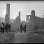 Black and white photograph of people and ruins after the fire, 1918.