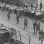 Black and white photograph of National Guard troops keeping a crowd back during a raid on strike headquarters in Minneapolis, 1934.