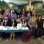 Color image of participants in the Operation Free Flu Shot program gather for a group photograph at the Hmong New Year celebration in St. Paul’s RiverCentre on November 24, 2012.