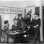 League of Women Voters swearing in new members or registering women to vote, ca. 1923. 