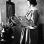 Black and white photograph of Elsa L. Jemne working at an easel, 1922.